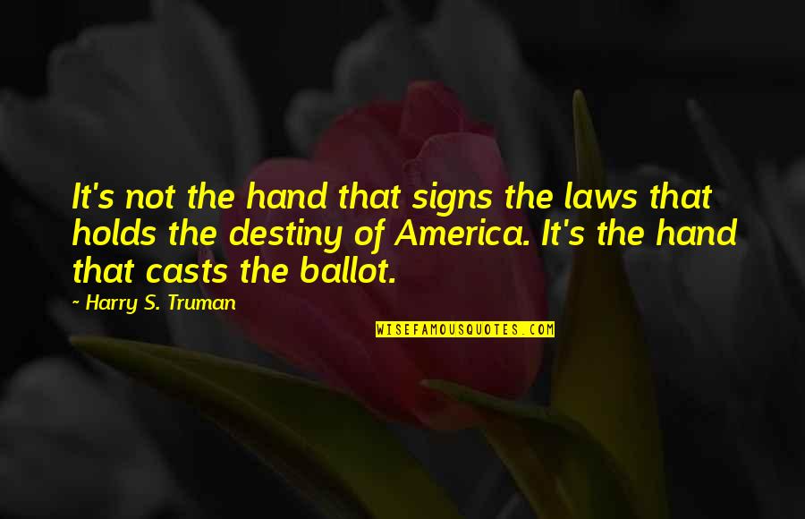 Holds Hands Quotes By Harry S. Truman: It's not the hand that signs the laws