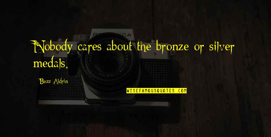 Houndlike Quotes By Buzz Aldrin: Nobody cares about the bronze or silver medals.