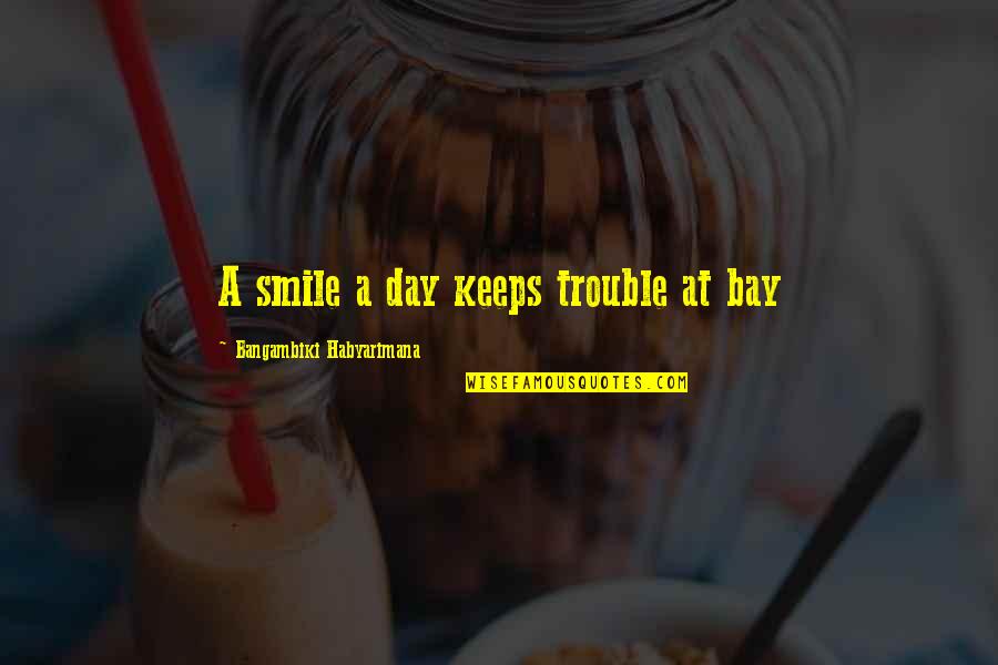 Human Kind Quote Quotes By Bangambiki Habyarimana: A smile a day keeps trouble at bay