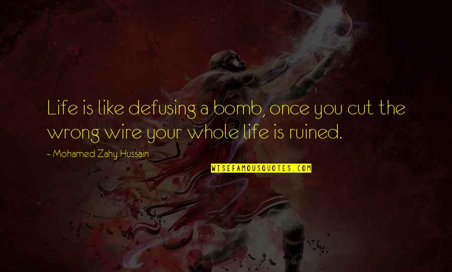 Hussain Quotes By Mohamed Zahy Hussain: Life is like defusing a bomb, once you