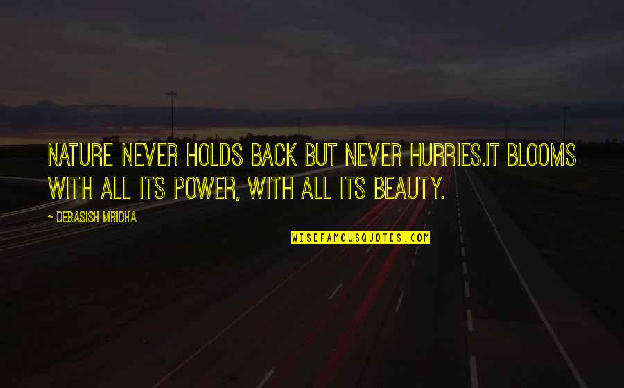 I Am In Love With Nature Quotes By Debasish Mridha: Nature never holds back but never hurries.It blooms I Am In Love With Nature Quotes By Debasish Mridha: Nature never holds back but never hurries.It blooms