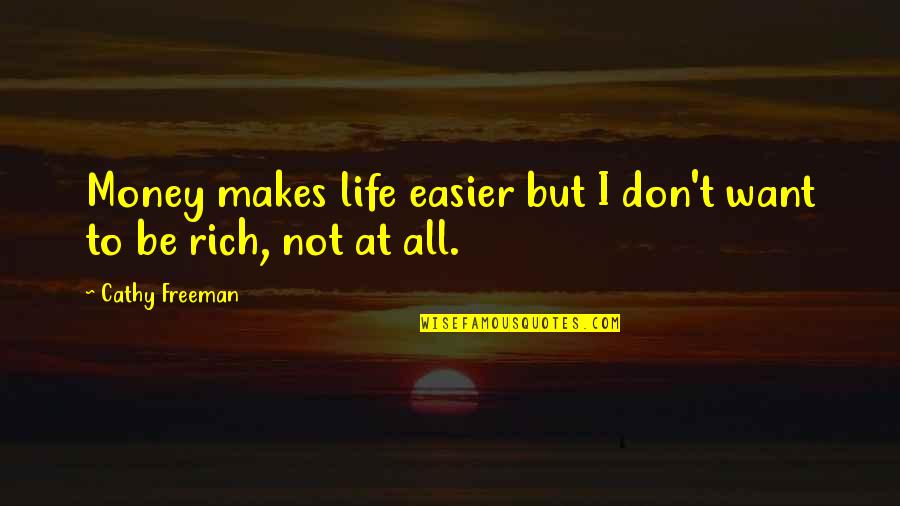 I'll Be Rich Quotes By Cathy Freeman: Money makes life easier but I don't want