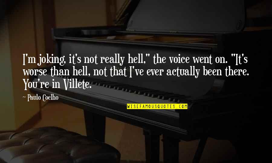 I'm Not There Quotes By Paulo Coelho: I'm joking, it's not really hell," the voice