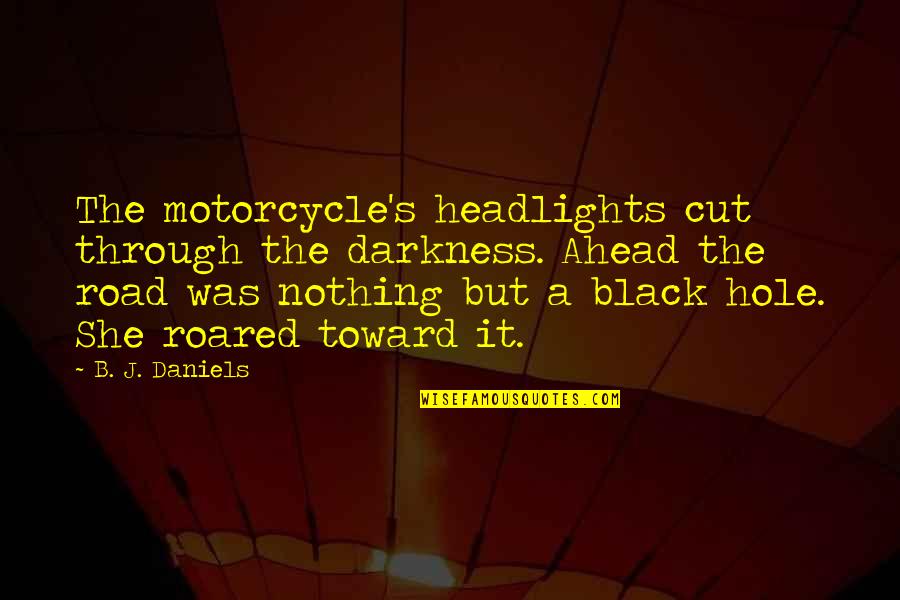 Impressional Quotes By B. J. Daniels: The motorcycle's headlights cut through the darkness. Ahead