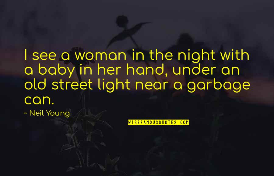 In Her Hand Quotes By Neil Young: I see a woman in the night with