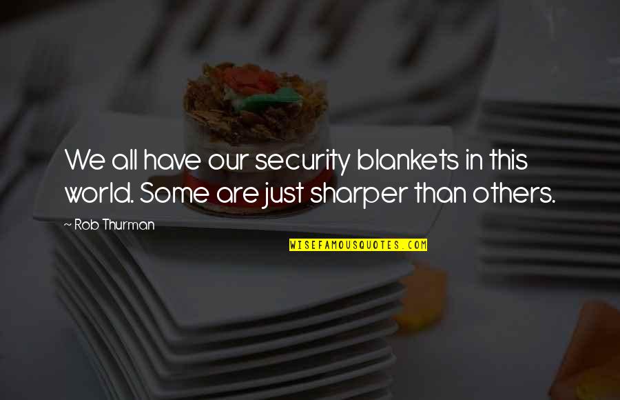 In Security Quotes By Rob Thurman: We all have our security blankets in this