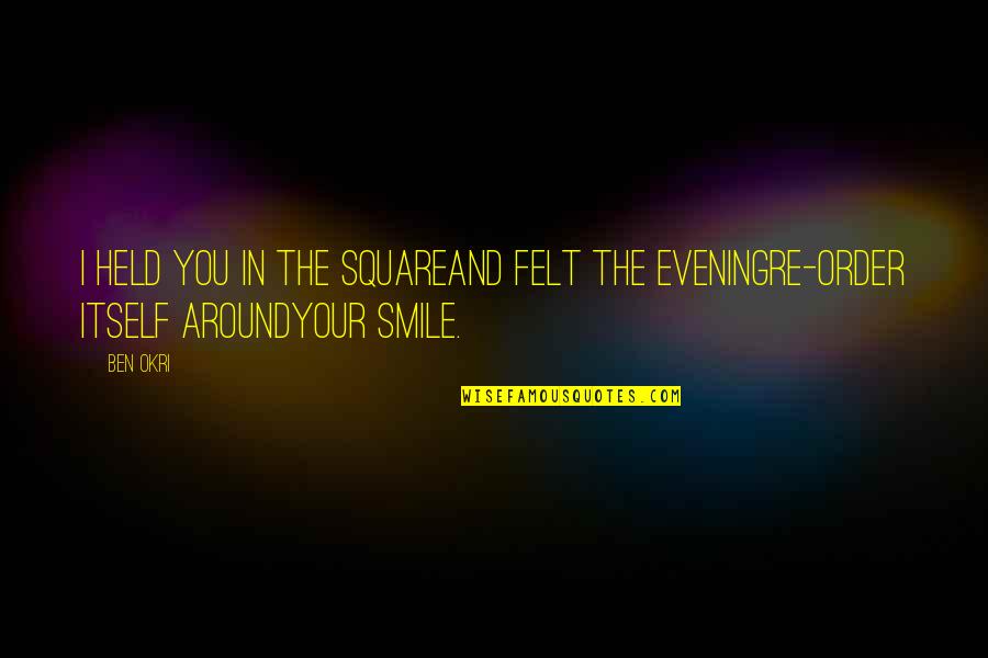 In Your Smile Quotes By Ben Okri: I held you in the squareAnd felt the