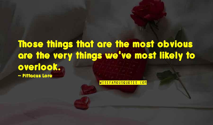 Induction Of Officers Quotes By Pittacus Lore: Those things that are the most obvious are