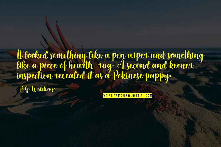 Inspection Quotes By P.G. Wodehouse: It looked something like a pen wiper and