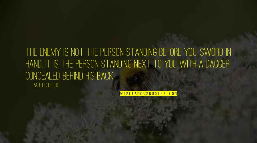 Inspirational Sword Quotes By Paulo Coelho: The enemy is not the person standing before