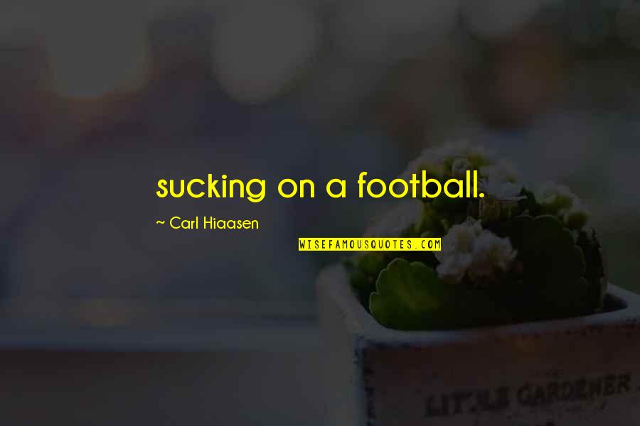 Ironikus Quotes By Carl Hiaasen: sucking on a football.