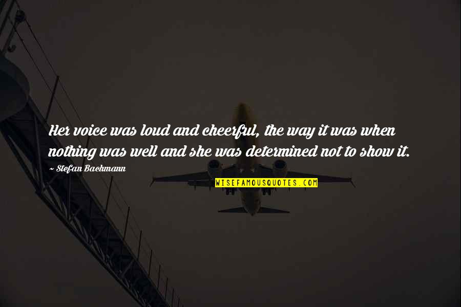 It's Not Attitude Quotes By Stefan Bachmann: Her voice was loud and cheerful, the way