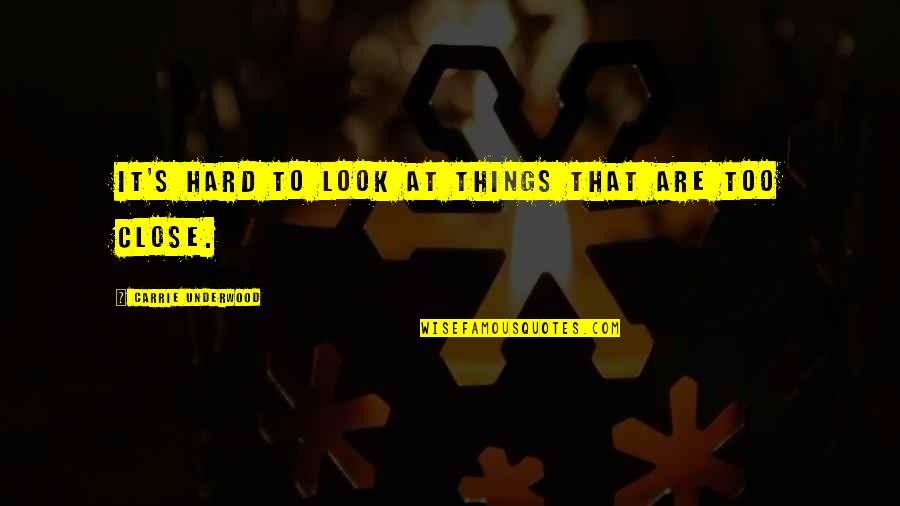 It's Too Hard Quotes By Carrie Underwood: It's hard to look at things that are