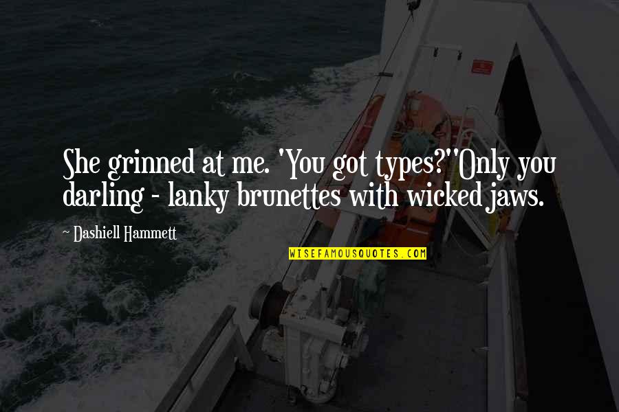 Jaws Quotes By Dashiell Hammett: She grinned at me. 'You got types?''Only you