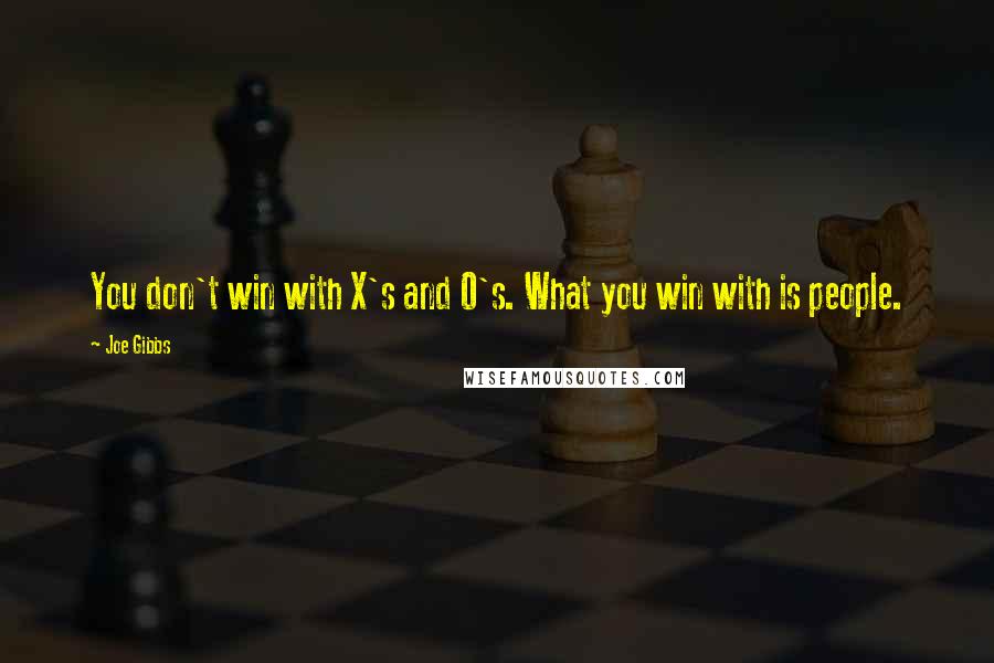 Joe Gibbs quotes: You don't win with X's and O's. What you win with is people.