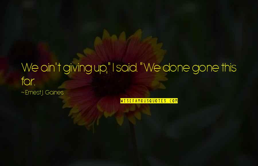 Johnny Crunch Quotes By Ernest J. Gaines: We ain't giving up," I said. "We done