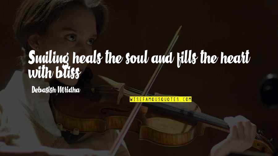 Julia Reyes Quotes By Debasish Mridha: Smiling heals the soul and fills the heart