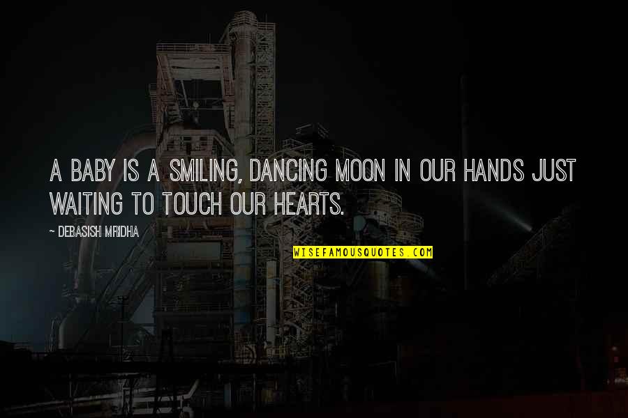Just Smiling Quotes By Debasish Mridha: A baby is a smiling, dancing moon in