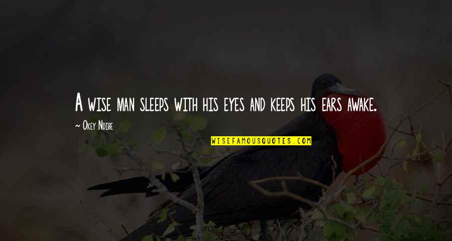 Jy Is Quotes By Okey Ndibe: A wise man sleeps with his eyes and