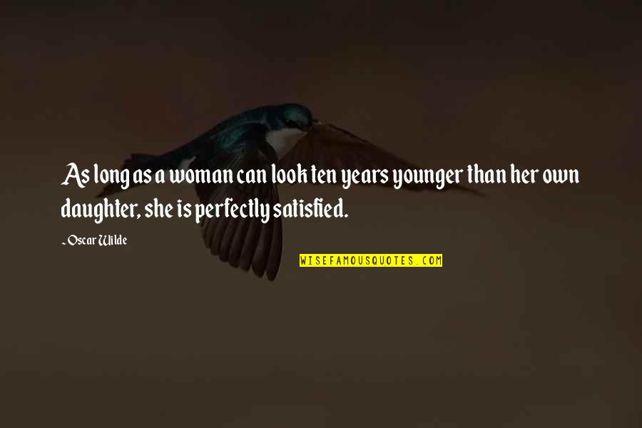 Kambenga Quotes By Oscar Wilde: As long as a woman can look ten Kambenga Quotes By Oscar Wilde: As long as a woman can look ten