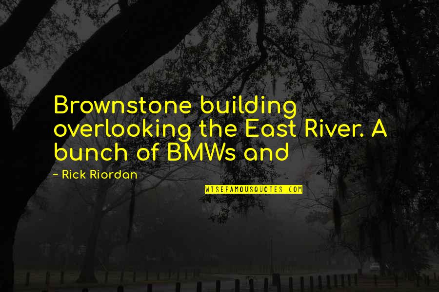 Khub Quotes By Rick Riordan: Brownstone building overlooking the East River. A bunch