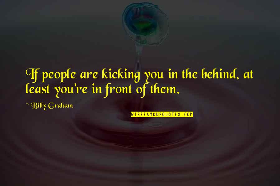 Kirschbaum Quotes By Billy Graham: If people are kicking you in the behind,