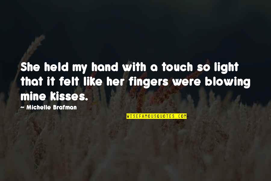Kisses That Quotes By Michelle Brafman: She held my hand with a touch so