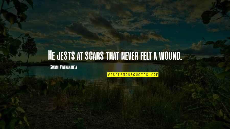 Kunchen Quotes By Swami Vivekananda: He jests at scars that never felt a
