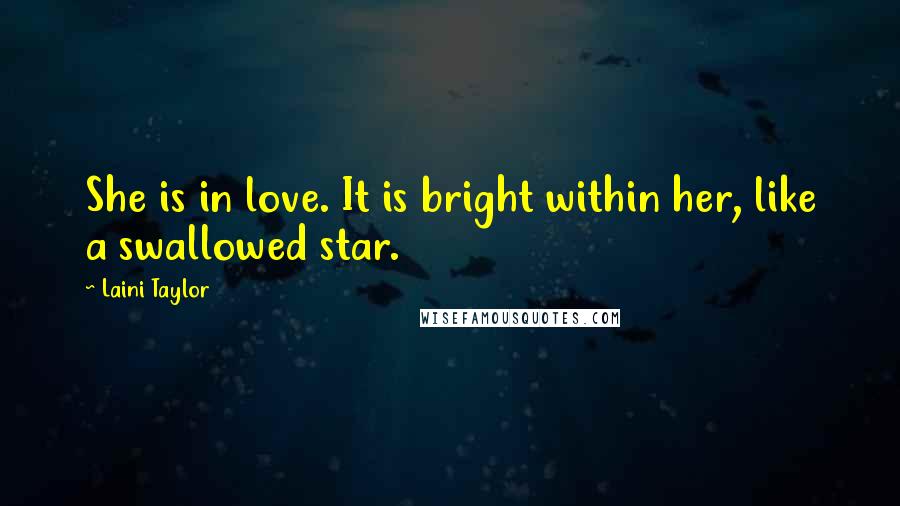 Laini Taylor quotes: She is in love. It is bright within her, like a swallowed star.