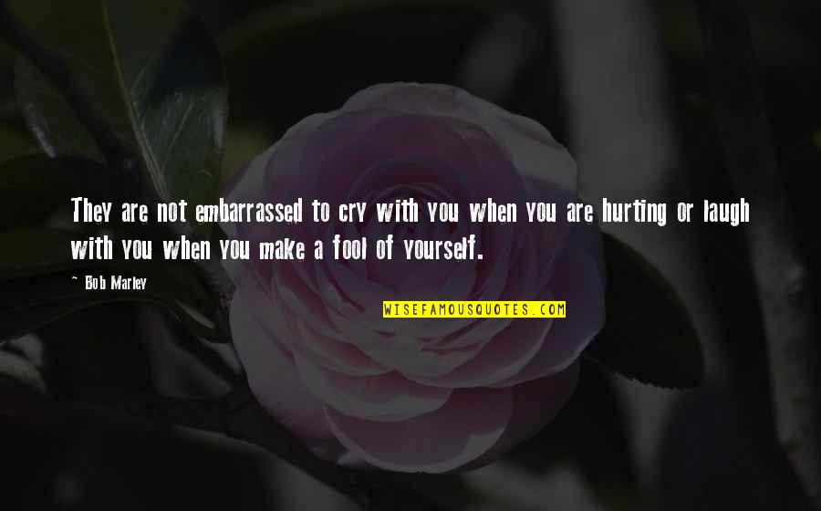 Laughing At Yourself Quotes By Bob Marley: They are not embarrassed to cry with you