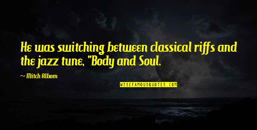 Lei Day Quotes By Mitch Albom: He was switching between classical riffs and the