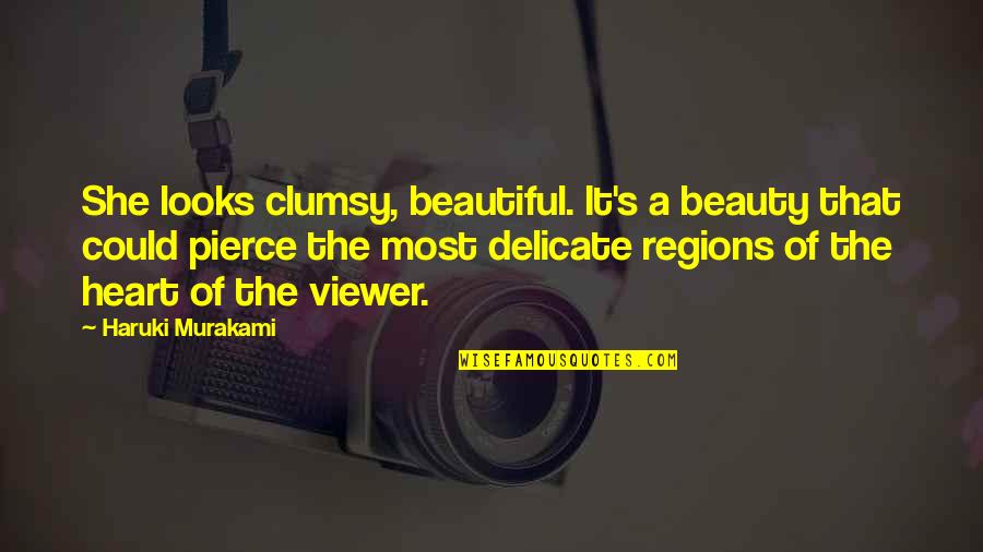 Liebgott Quotes By Haruki Murakami: She looks clumsy, beautiful. It's a beauty that