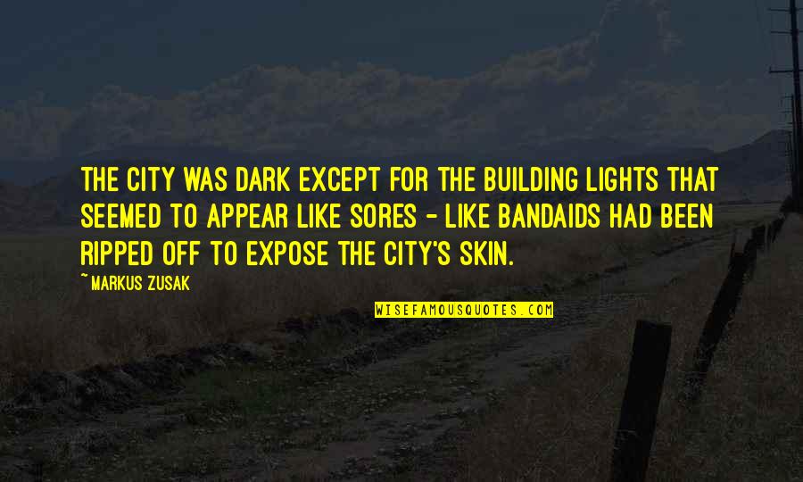 Life From Movie Stars Quotes By Markus Zusak: The city was dark except for the building