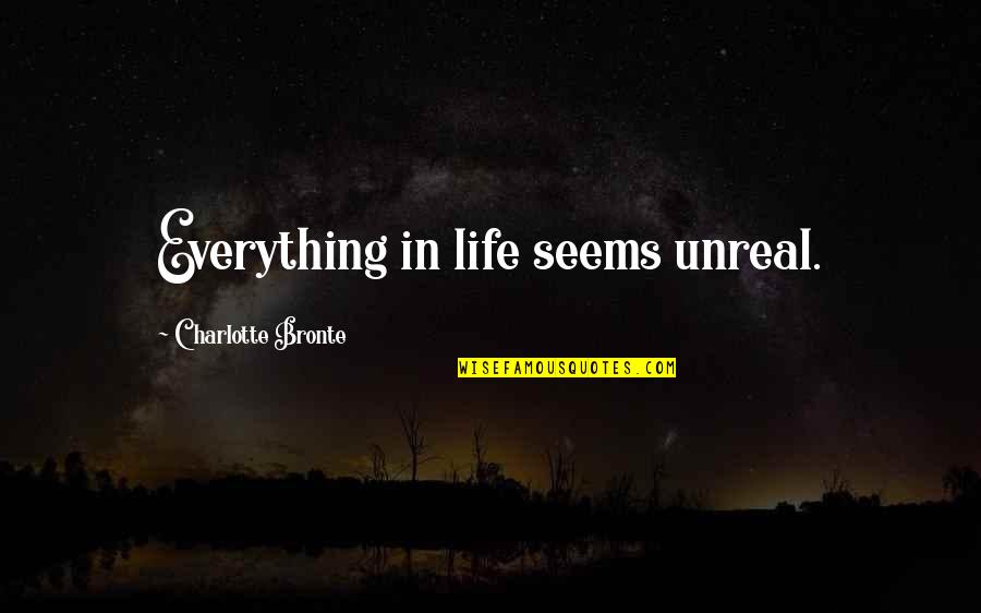 Life Is Unreal Quotes By Charlotte Bronte: Everything in life seems unreal.