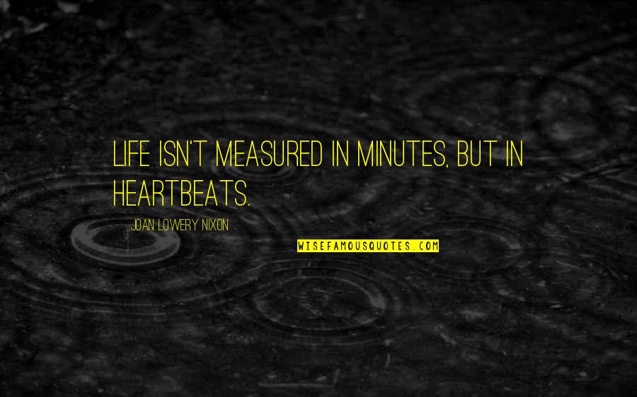 Life Measured Quotes By Joan Lowery Nixon: Life isn't measured in minutes, but in heartbeats.