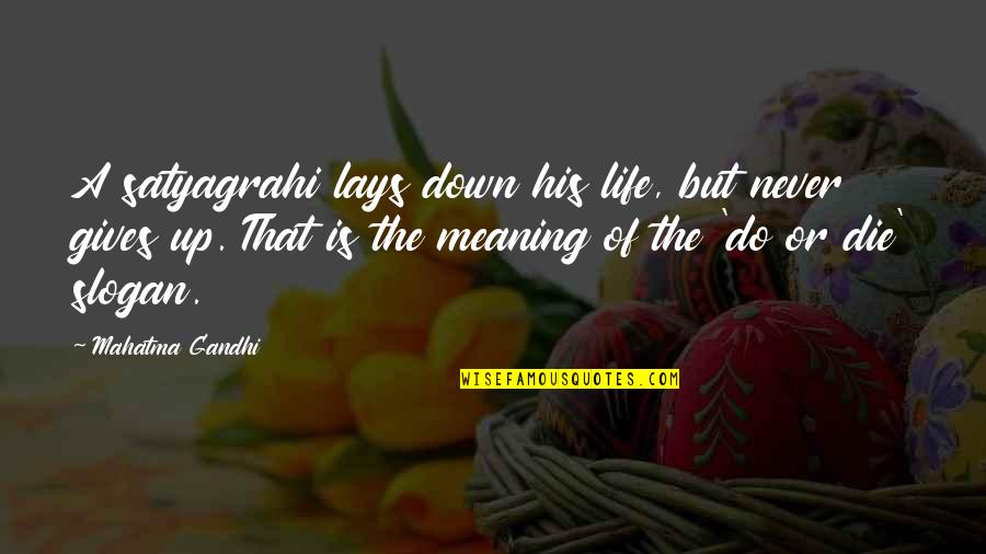 Life Slogans Quotes By Mahatma Gandhi: A satyagrahi lays down his life, but never