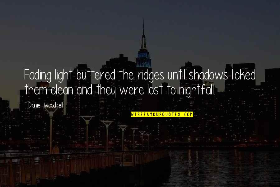 Light And Shadows Quotes By Daniel Woodrell: Fading light buttered the ridges until shadows licked