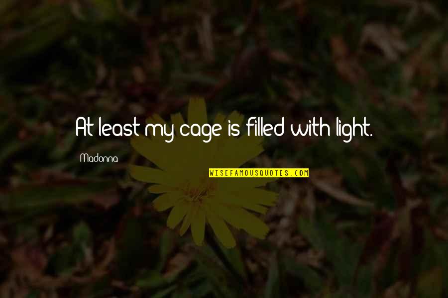 Light Filled Quotes By Madonna: At least my cage is filled with light.