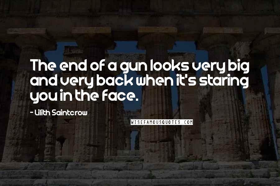Lilith Saintcrow quotes: The end of a gun looks very big and very back when it's staring you in the face.