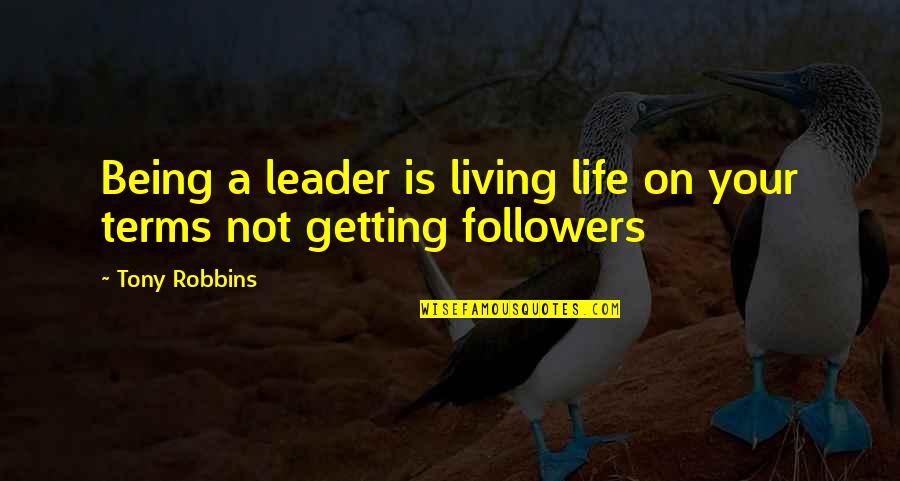 Living My Life On My Own Terms Quotes By Tony Robbins: Being a leader is living life on your