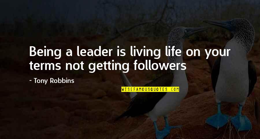Living Your Life On Your Terms Quotes By Tony Robbins: Being a leader is living life on your