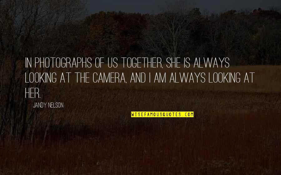 Looking For Beautiful Quotes By Jandy Nelson: In photographs of us together, she is always