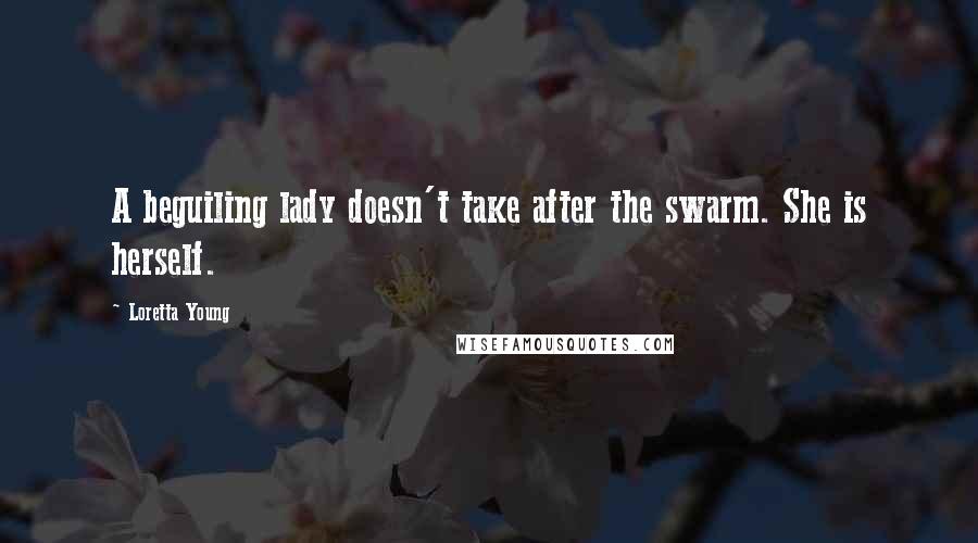 Loretta Young quotes: A beguiling lady doesn't take after the swarm. She is herself.