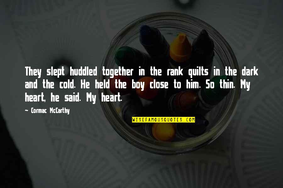 Loton Tulokset Quotes By Cormac McCarthy: They slept huddled together in the rank quilts Loton Tulokset Quotes By Cormac McCarthy: They slept huddled together in the rank quilts