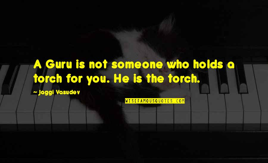 Love Meditation Quotes By Jaggi Vasudev: A Guru is not someone who holds a