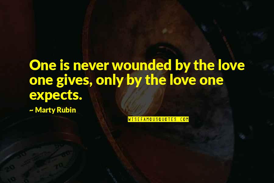 Love Never Gives Up Quotes By Marty Rubin: One is never wounded by the love one