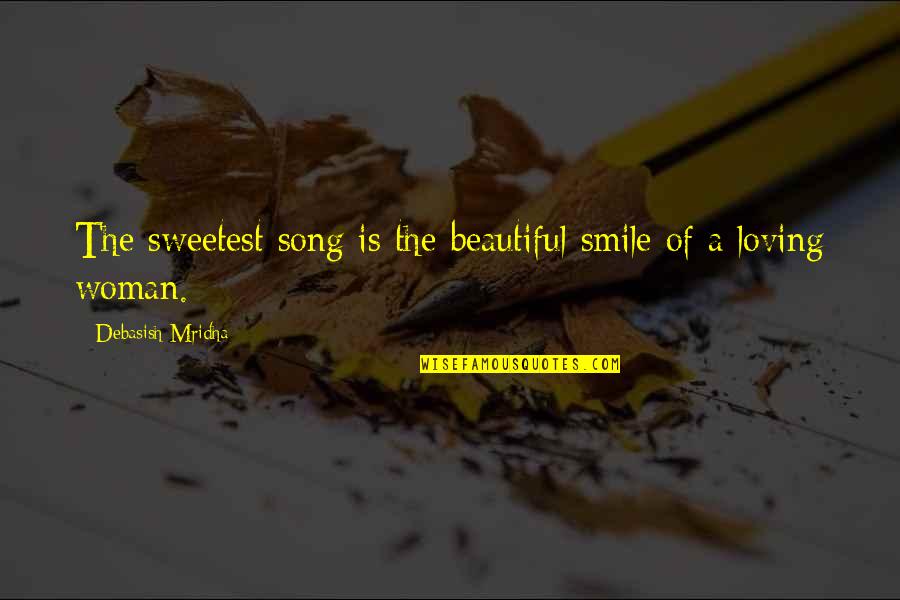 Loving To Smile Quotes By Debasish Mridha: The sweetest song is the beautiful smile of