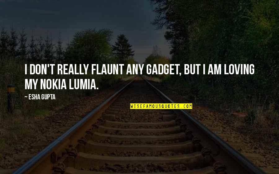 Lumia Quotes By Esha Gupta: I don't really flaunt any gadget, but I