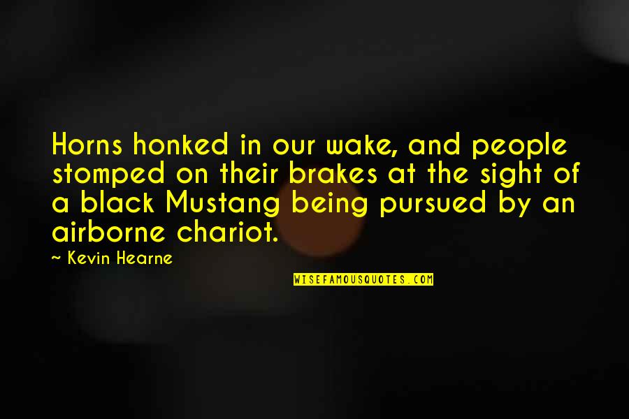 Lybaert Jan Quotes By Kevin Hearne: Horns honked in our wake, and people stomped Lybaert Jan Quotes By Kevin Hearne: Horns honked in our wake, and people stomped