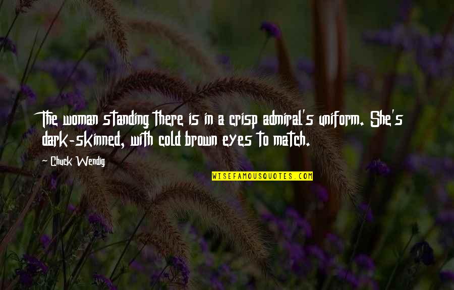 Mackennas Gold Quotes By Chuck Wendig: The woman standing there is in a crisp Mackennas Gold Quotes By Chuck Wendig: The woman standing there is in a crisp